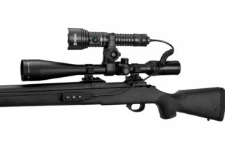 Black sniper rifle with a long scope and wired accessory mounted on a white background, viewed sideways to show the scope and rail.
