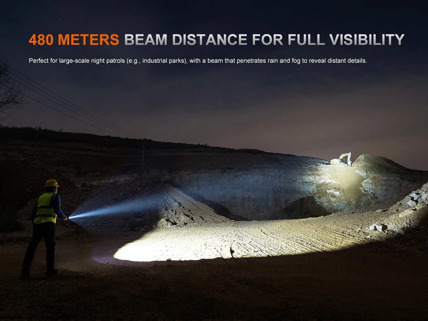 Night construction site: worker in yellow helmet and reflective vest shines a beam across a rocky quarry toward a distant excavator.