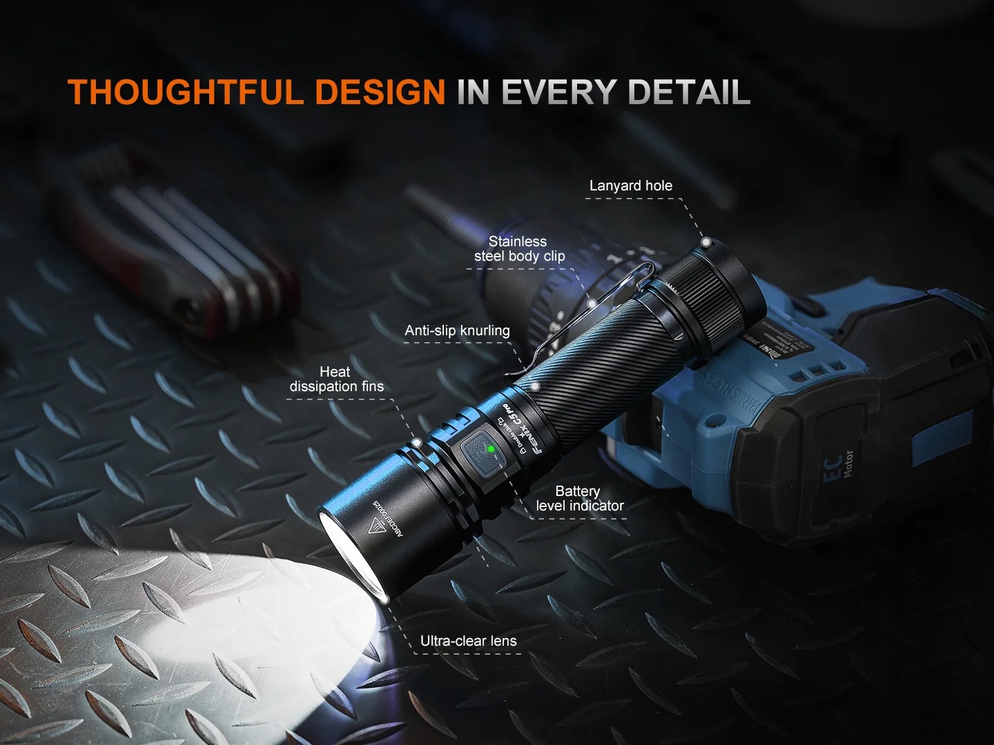 Flashlight mounted on a battery pack on a metal diamond-plate surface, highlighting features like anti-slip knurling, stainless steel body clip, heat-dissipation fins, lanyard hole, battery level indicator, and ultra-clear lens.