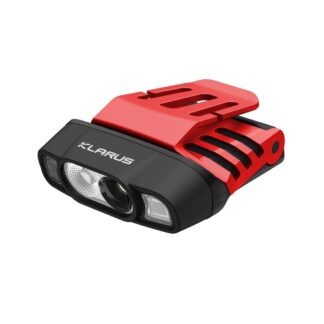 Red and black Klarus headlamp with dual front LEDs and clear lens, viewed from the front-right corner (compact, wearable light)