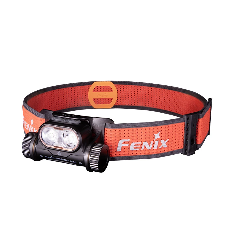 Orange and black Fenix headlamp with an adjustable strap and dual front LEDs, designed for hands-free lighting.