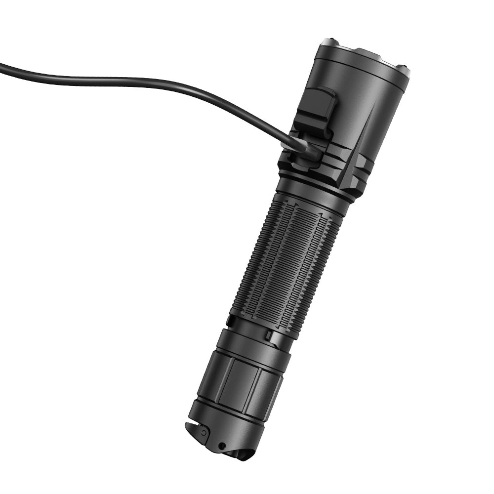 Black tactical flashlight with textured grip and side switch, angled diagonally with a cable connected to its head (product photo).